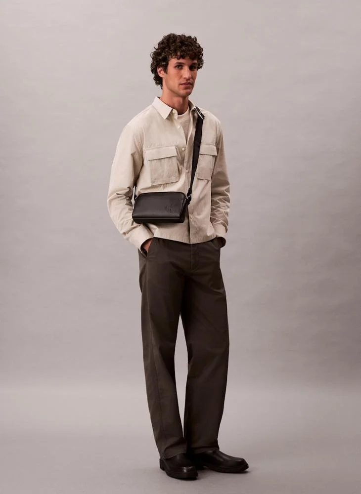 CALVIN KLEIN  Embossed Monogram Logo Camera Bag for Men | Best Price UAE